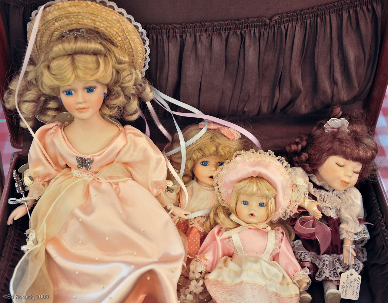 Suitcase dolls- I made this photograph in an antique store at the Mt. Dora antique mall.