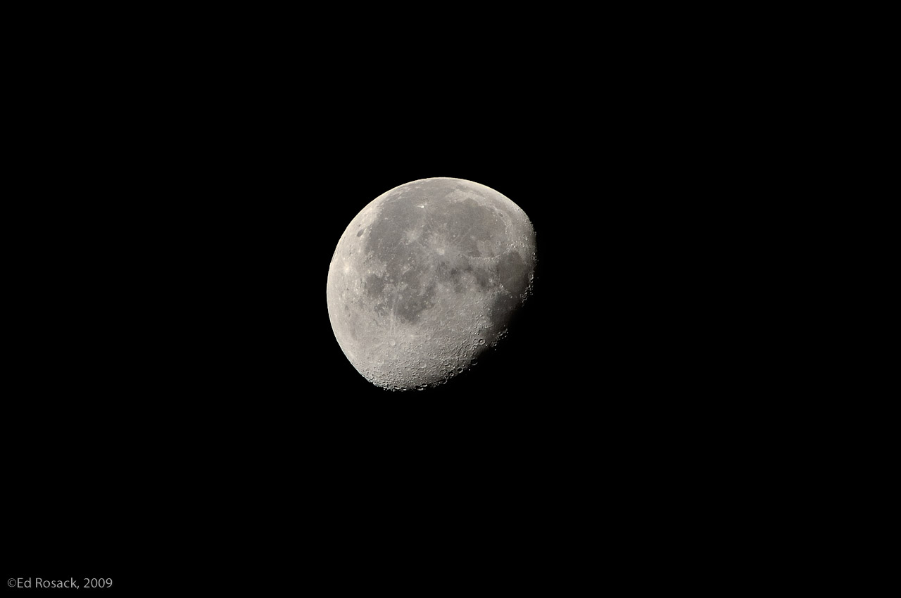 The moon at 400mm- Taken from my front porch, f/8 @ 1/640 sec.  I made a couple of test shots using the spot meter and then dialed in -2/3 exposure compensation.