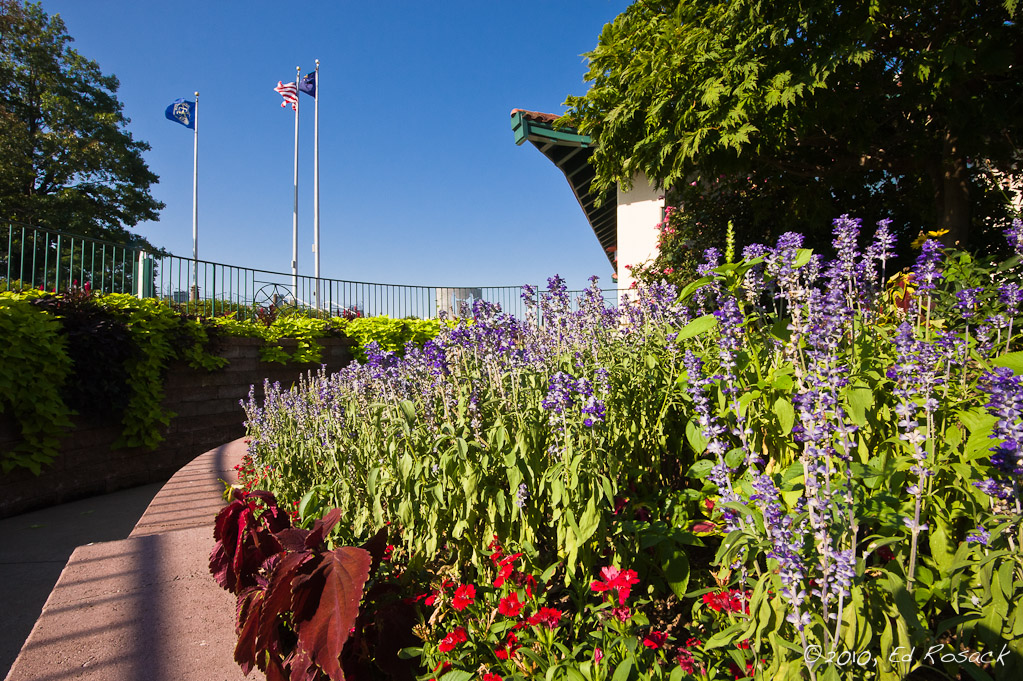 The Evansville Visitor Center: Flowers, flags, and statue